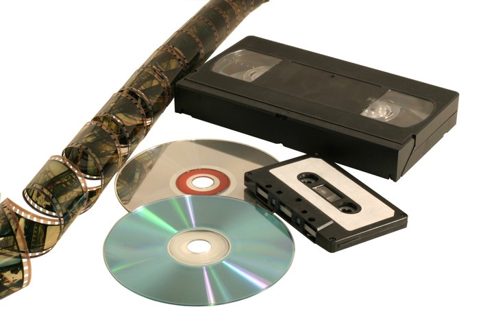Roll of film, VHS tape, audiocassette, CD, and DVD